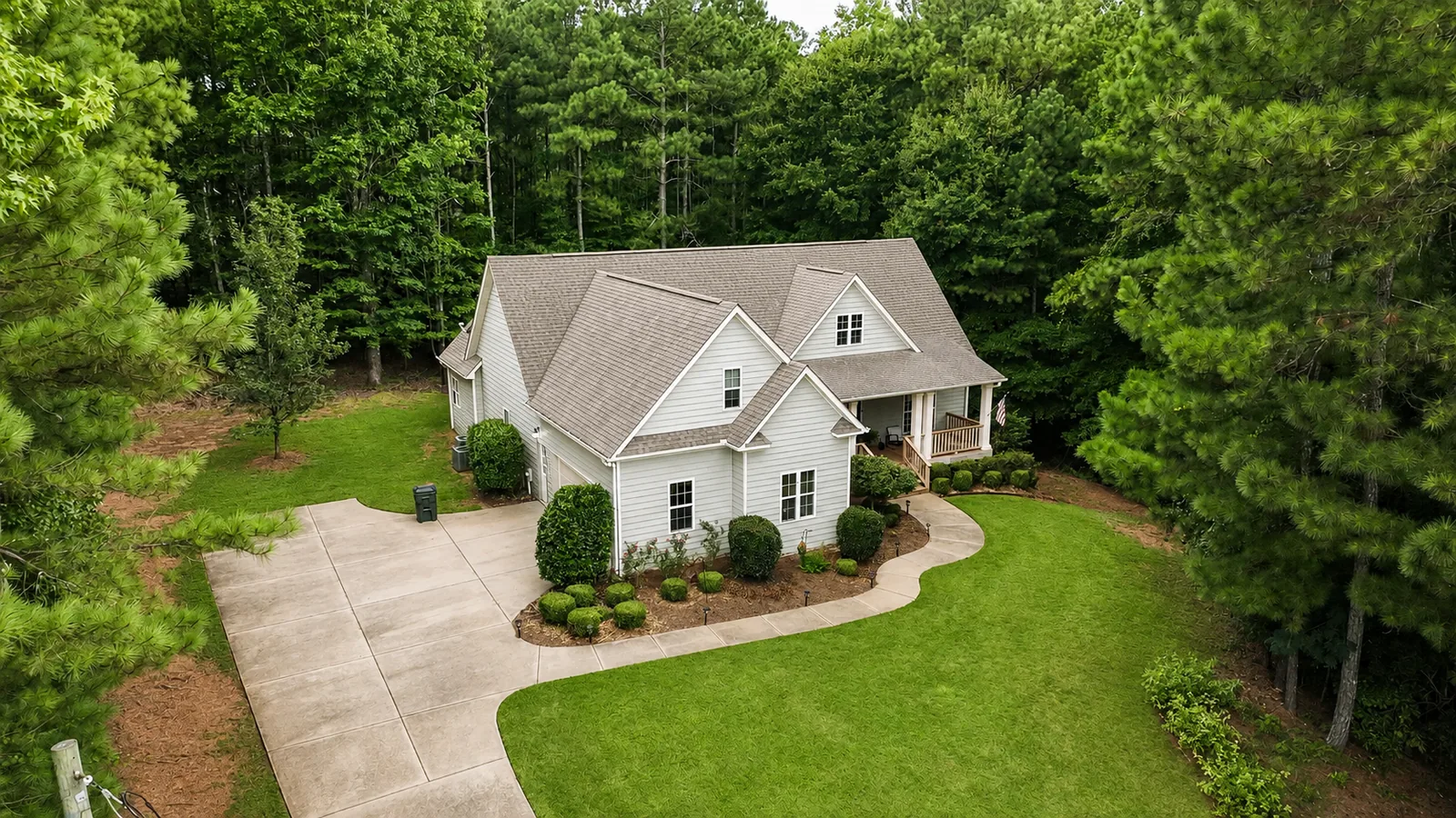 Aerial — Home Tucked Among the Trees