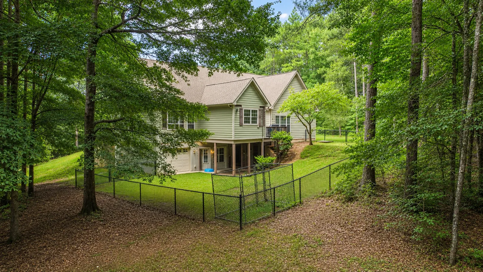 Fenced Backyard & Woodland