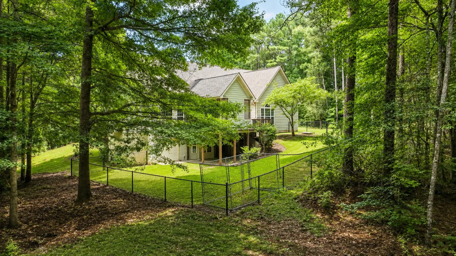 Wooded Fenced Backyard