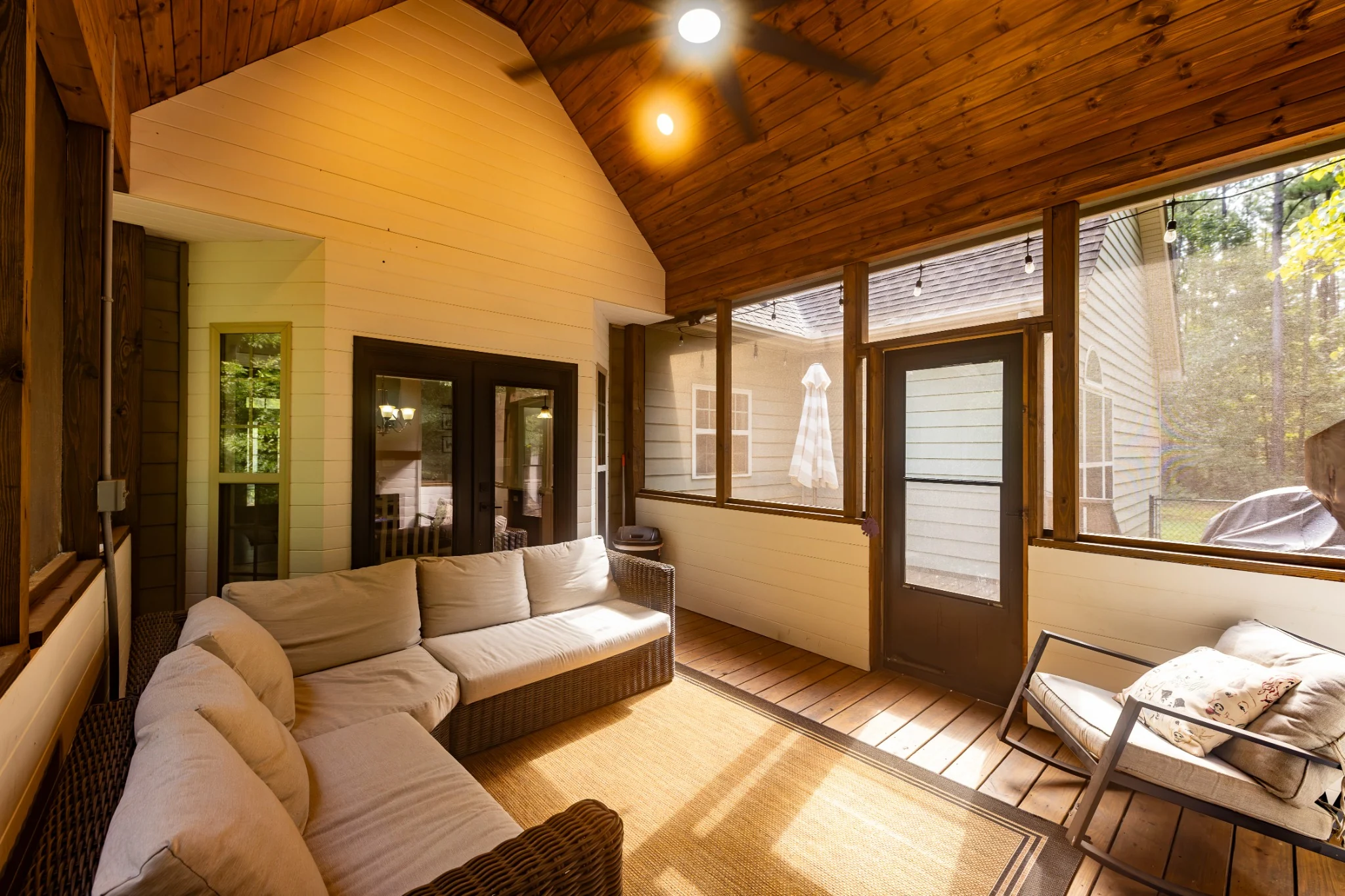 Screened porch seating area